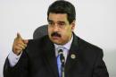 Venezuela's President Nicolas Maduro talks to the media during a news conference after the 17th Non-Aligned Summit in Porlamar