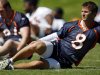 REPLACES SECOND AND THIRD SENTENCE TO UPDATE THAT FINNERTY HAS BEEN FOUND DEAD - FILE - In this May 29, 2008 file photo, Denver Broncos backup quarterback Cullen Finnerty stretches at the team's headquarters in Denver. Authorities say Finnerty who went missing over the weekend has been found dead Tuesday, May 28, 2013 in Michigan. He led Grand Valley State University to three Division II national titles and more than 50 wins during his four years as a starter in Allendale, Mich., last decade. (AP Photo/David Zalubowski, File)