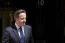 Britain's Prime Minister David Cameron waits at Downing Street to meet Columbia's President Juan Manuel Santos Calder—n in London