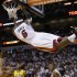 Miami Heat forward LeBron James (6) hangs from the basket after dunking the ball during the second half of Game 2 in their NBA basketball Eastern Conference finals playoff series against the Indiana Pacers, Friday, May 24, 2013, in Miami. (AP Photo/Lynne Sladky)