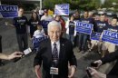 Sen. Richard Lugar responds to a question outside of a voting location Tuesday, May 8, 2012, in Greenwood, Ind. Lugar is being challenged by two-term state Treasurer Richard Mourdock. (AP Photo/Darron Cummings)