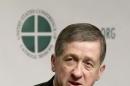 Bishop Blase Cupich answers questions from the press in Bellevue, Washington