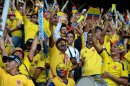 Colombian fans cheer before the start of a World Cup qualifier against Ecuador in Barranquilla on September 6, 2013