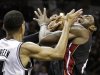 Miami Heat's LeBron James (6) is defended by San Antonio Spurs' Danny Green during the second half at Game 5 of the NBA Finals basketball series, Sunday, June 16, 2013, in San Antonio. (AP Photo/Eric Gay)