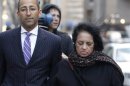 Roomy Khan, the former Intel executive exits the Manhattan Federal Courthouse with her lawyer following her sentencing in New York