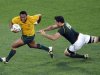 Australia Wallabies' Sekope Kepu avoids South Africa Springboks' Francois Louw as he runs with the ball behind the try line during their Rugby World Cup quarter-final match at Wellington Regional Stadium