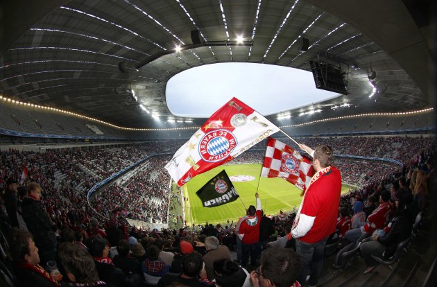 Supporters of Bayern Munich wave flags during public viewing event in Munich