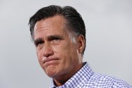 Republican presidential candidate and former Massachusetts Gov. Mitt Romney pauses as he tells a personal story while he campaigns at Tradition Town Square in Port St. Lucie, Fla., Sunday, Oct. 7, 2012. (AP Photo/Charles Dharapak)
