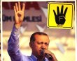 رئيس الوزراء التركي رجب طيب أردوجان يشير إلى شعار رابعة دعما للاخوان