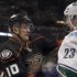 Anaheim Ducks' Perry attempts to incite Vancouver Canucks' Edler into a fight during their NHL hockey game in Anaheim