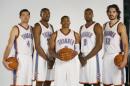 Oklahoma City Thunder players, from left, Nick Collison, Kevin Durant, Russell Westbrook, Serge Ibaka and Steven Adams pose for a photo during media day in Oklahoma City, Monday, Sept. 28, 2015. (AP Photo/Sue Ogrocki)
