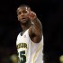 Baylor's Pierre Jackson (55) points to the crowd during the second half of an NIT semifinal basketball game against Brigham Young Tuesday, April 2, 2013, in New York. (AP Photo/Frank Franklin)