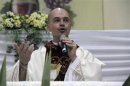 Brazilian priest Roberto Fransisco Daniel attends mass at a church in Bauru