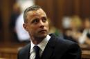 File photo of Olympic and Paralympic track star Oscar Pistorius sitting in the dock in the North Gauteng High Court in Pretoria