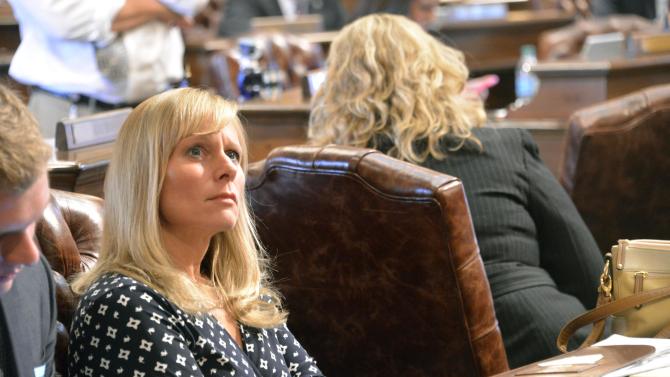 State Rep. Cindy Cindy Gamrat looks at the vo