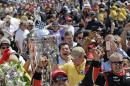 Juan Pablo Montoya, of Colombia, celebrates after winning the 99th running of the Indianapolis 500 auto race at Indianapolis Motor Speedway in Indianapolis, Sunday, May 24, 2015. (AP Photo/Darron Cummings)