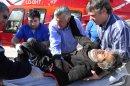 **CORRECTS DATE** After being found in a remote mountain cabin, Uruguayan Raul Gomez is carried from a helicopter and placed on stretcher in San Juan, Argentina, Sunday, Sept. 8, 2013. The 58-year-old man who spent four months lost while trying to walk across the Andean mountains is recovering in an Argentine hospital. It wasn't clear at first what led Gomez with apparently no mountaineering experience to make the trek from Chile. Now it turns out that Gomez was fleeing from the law. Chilean authorities say child sex abuse charges were filed against him in April. (AP Photo/Diario El Zonda,Agustin Moya)