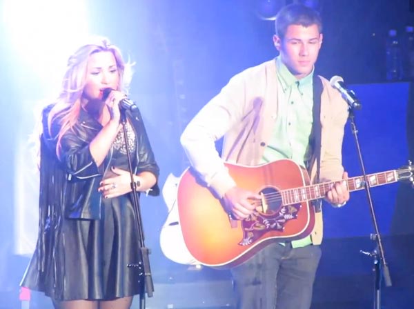 Nick Jonas Joins Demi Lovato On Stage  Watch