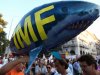Protesters hold a shark balloon, featuring International Monetary Fund (IMF) in the northern Greek port city of Thessaloniki, Saturday, Sept. 8, 2012. Greek Prime Minister Antonis Samaras says the final round of austerity measures contains painful and unjust cuts but is necessary to restore Greece's credibility and continue to receive funding from creditors. (AP Photo/Thanassis Stavrakis)