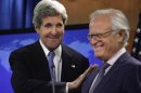 U.S. Secretary of State John Kerry greets Martin Indyk at the State Department in Washington