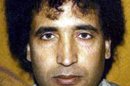 FILE - This undated file photo, issued by the British Crown Office, shows Abdel Baset al-Megrahi. A son says Al-Megrahi, the former Libyan intelligence officer who was the only person ever convicted in the 1988 bombing of a PanAm flight over Scotland that killed 270 people, has died in Tripoli, Libya. Al-Megrahi suffered from prostate cancer. His death was announced Sunday, May 20, 2012, by his son Khaled. (AP Photo/Crown Copyright, File)