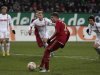 Bayern Munich's Mueller scores goal against Augsburg during German Bundesliga soccer match in Augsburg