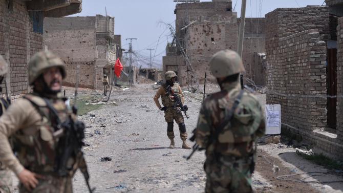 Pakistani soldiers patrol a town during a military operation against Taliban militants in North Waziristan, on July 9, 2014