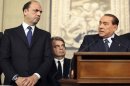Italy's former Prime Minister Berlusconi speaks after meeting with Italian President Giorgio Napolitano at Quirinale palace in Rome