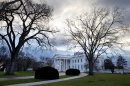 Clouds roil over the White House in Washington on the morning of Sunday, Dec. 30, 2012, as Washington has less than 48 hours to avert the 