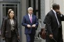 J.P. Morgan CEO Dimon leaves the U.S. Justice Department after meeting with Attorney General Holder, in Washington