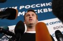 Opposition leader Navalny speaks to the media at his campaign headquarters after voting closed in a mayoral election in Moscow