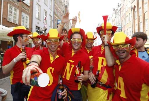Spanish fans enjoy themselves prior to their first match of the Euro 2012 against Italy in the Long Market in Gdansk