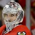 Chicago Blackhawks goalie Corey Crawford (50) takes break during a time out during Game 2 of the NHL hockey Stanley Cup Finals against the Boston Bruins, Saturday, June 15, 2013, in Chicago. (AP Photo/Nam Y. Huh)