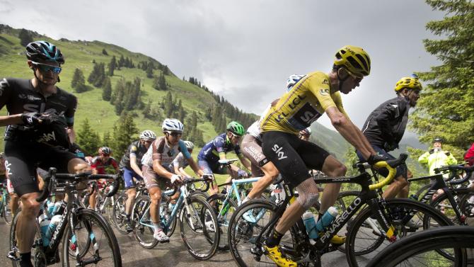Britain&#39;s Chris Froome, wearing the overall leader&#39;s yellow jersey, climbs during the twentieth stage of the Tour de France cycling race over 146.5 kilometers (90.7 miles) with start in Megeve and finish in Morzine-Avoriaz, France, Saturday, July 23, 2016. (AP Photo/Peter Dejong)