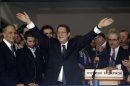Newly elected President of Cyprus Anastasiades waves to supporters during a proclamation ceremony in Nicosia
