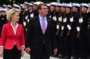 German Defence Minister Ursula von der Leyen (L) and her US counterpart Ashton Carter review an honour guard at the defence ministry in Berlin on June 22, 2015