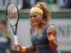 Serena Williams of the U.S. celebrates scoring a point against Caroline Garcia of France  in their second round match of the French Open tennis tournament, at Roland Garros stadium in Paris, Wednesday, May 29, 2013. Williams won in two sets 6-1, 6-2.(AP Photo/Christophe Ena))