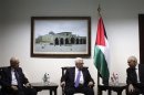 Palestinian President Abbas meets with Arab League Secretary-General Elaraby and Egyptian FM Amr upon their arrival in Ramallah