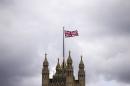 The Union flag above the Houses of Parliament in central London on September 26, 2014
