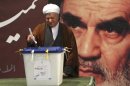 Former President Rafsanjani casts his ballot in a parliamentary election in Tehran