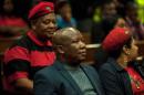 Economic Freedom Fighters leader Julius Malema sits in the Gauteng North High Court in Pretoria on June 1, 2015
