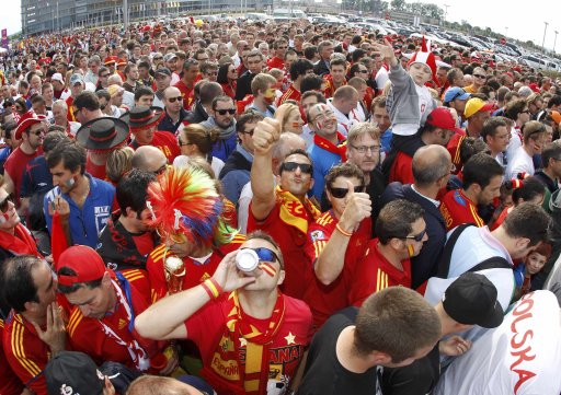 Spanish fans cheer outside PGE Arena before their team's first match in the Euro 2012 against Italy in Gdansk
