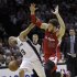 San Antonio Spurs' Tony Parker (9), of France, is fouled by  Los Angeles Clippers' Blake Griffin (32) while moving the ball upcourt during the second quarter of Game 2 of an NBA basketball Western Conference semifinal playoff series on Thursday, May 17, 2012, in San Antonio. (AP Photo/Eric Gay)