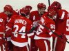 Detroit Red Wings players celebrate with teammate Niklas Kronwall after he scored the game winning goal against Edmonton Oilers goalie Nikolai Khabibulin during the third period of their NHL hockey game in Detroit