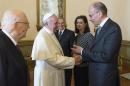 Pope Francis meets Italy's Prime Minister Letta during a meeting with Italy's President Napolitano at the Quirinale Palace in Rome