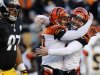 Cincinnati Bengals Kevin Huber congratulates kicker Josh Brown on his game-winning field goal against the Pittsburgh Steelers at the end of the fourth quarter of their NFL football game in Pittsburgh