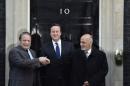 Britain's Prime Minister David Cameron, President Ashraf Ghani of Afghanistan and Pakistan's Prime Minister Nawaz Sharif pose on the steps of Number 10 Downing Street in London