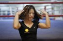 India's boxer MC Mary Kom gestures during an interview with Reuters in Pune