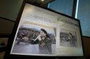 A computer screen shows websites displaying an undated photo of China's new first lady Peng Liyuan in younger days singing to martial law troops following the 1989 bloody military crackdown on pro-democracy protesters, in Beijing, China, Thursday, March 28, 2013. The photo appeared online this week but was swiftly scrubbed from China's Internet before it could generate discussion online. But the image - seen and shared by outside observers - revived a memory the leadership prefers to suppress and shows one of the challenges in presenting Peng on the world stage as the softer side of China. (AP Photo/Ng Han Guan)