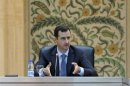 Syria's President Bashar al-Assad speaks to the new government in Damascus